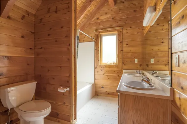 a bathroom with a sink and toilet