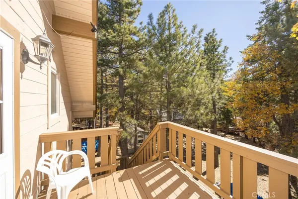 a view of balcony with two trees