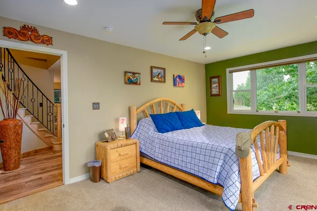 a bathroom with a double vanity sink mirror and double