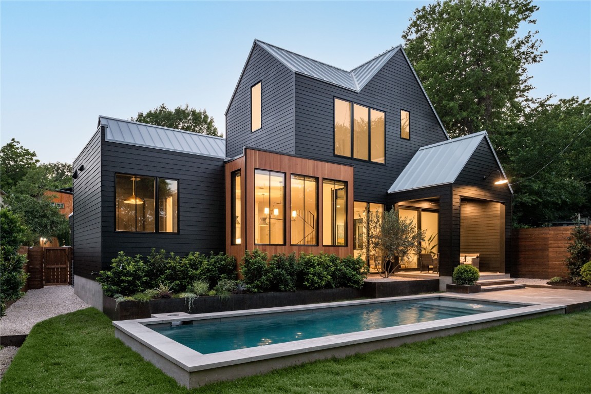 1135 Gillespie Place Austin, TX 78704 - Photo 1 of 1 a view of a house with sitting area and garden