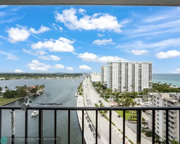 a view of a lake from a balcony
