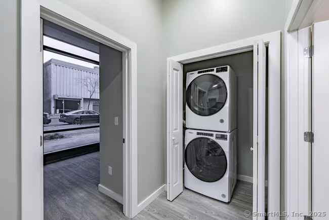 333 State Street, Unit 703 Bridgeport, CT 06604 - Photo 22 of 27 a view of living room washer and dryer