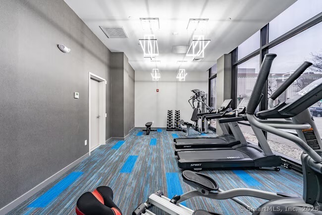 333 State Street, Unit 703 Bridgeport, CT 06604 - Photo 26 of 27 a view of a room with gym equipment