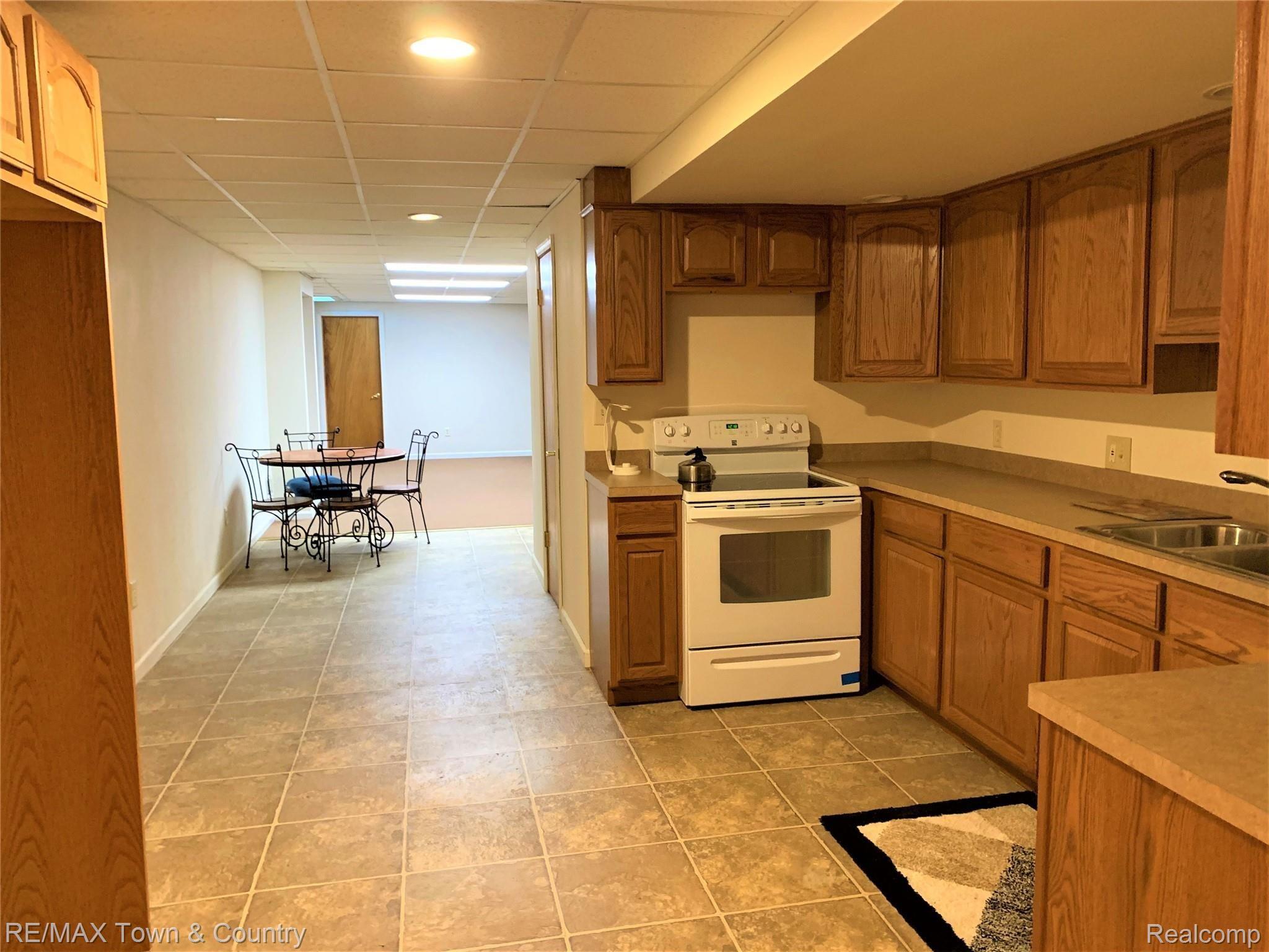 8215 Elms Road Flushing, MI 48433 - Photo 30 of 46 elms basement kitchen3.jpg