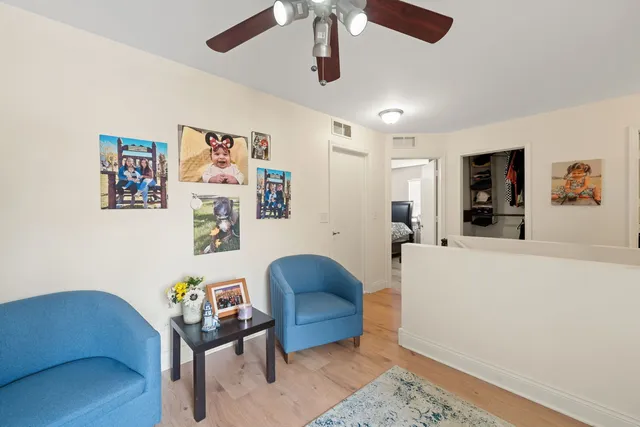 a living room with furniture and a couch