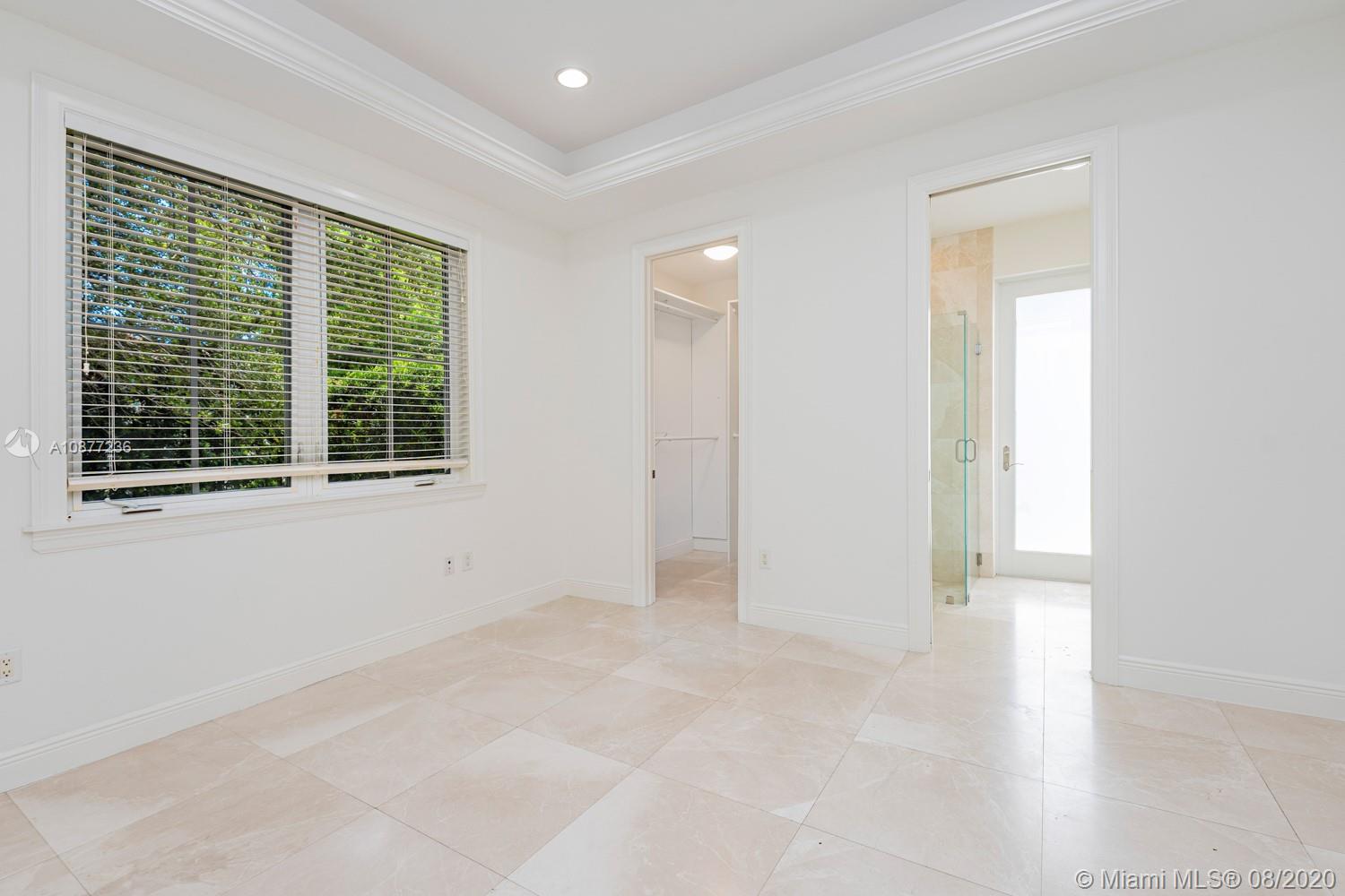 7260 Southwest 119th Street Pinecrest, FL 33156 - Photo 19 of 40 a view of an empty room with a window