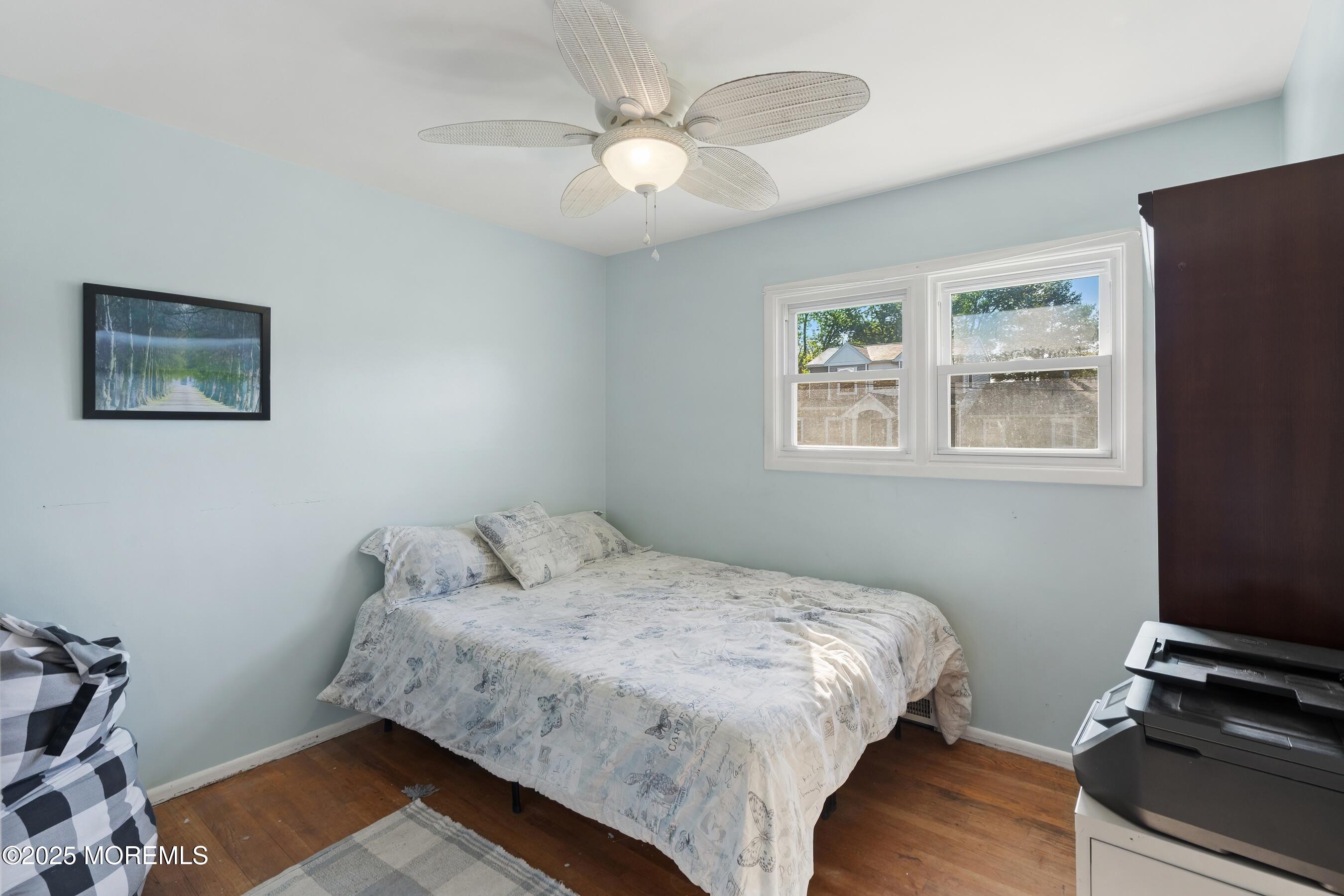 10 Marion Avenue Howell, NJ 07731 - Photo 15 of 26 a bedroom with a bed and a window