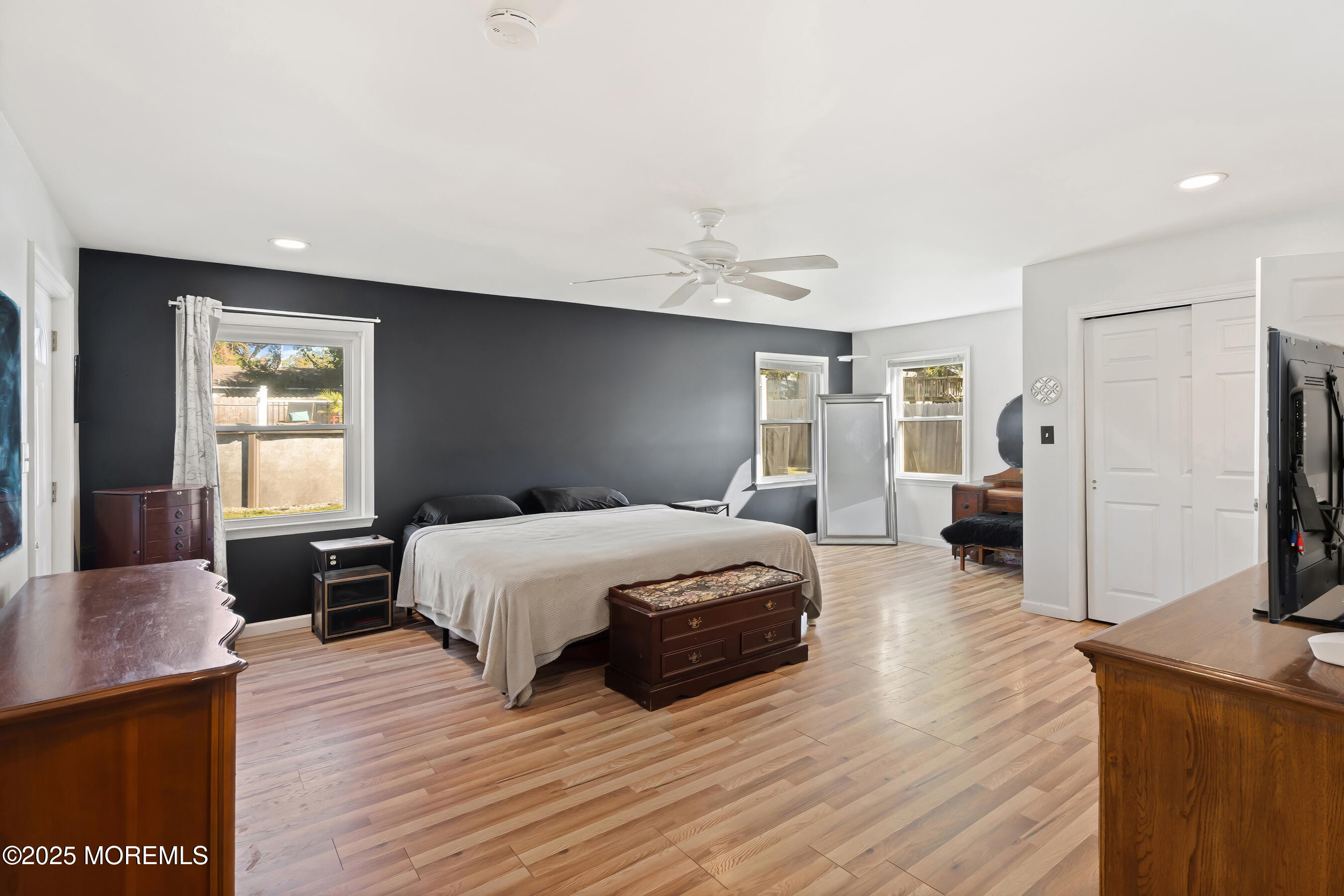10 Marion Avenue Howell, NJ 07731 - Photo 16 of 26 a spacious bedroom with a bed and wooden floor