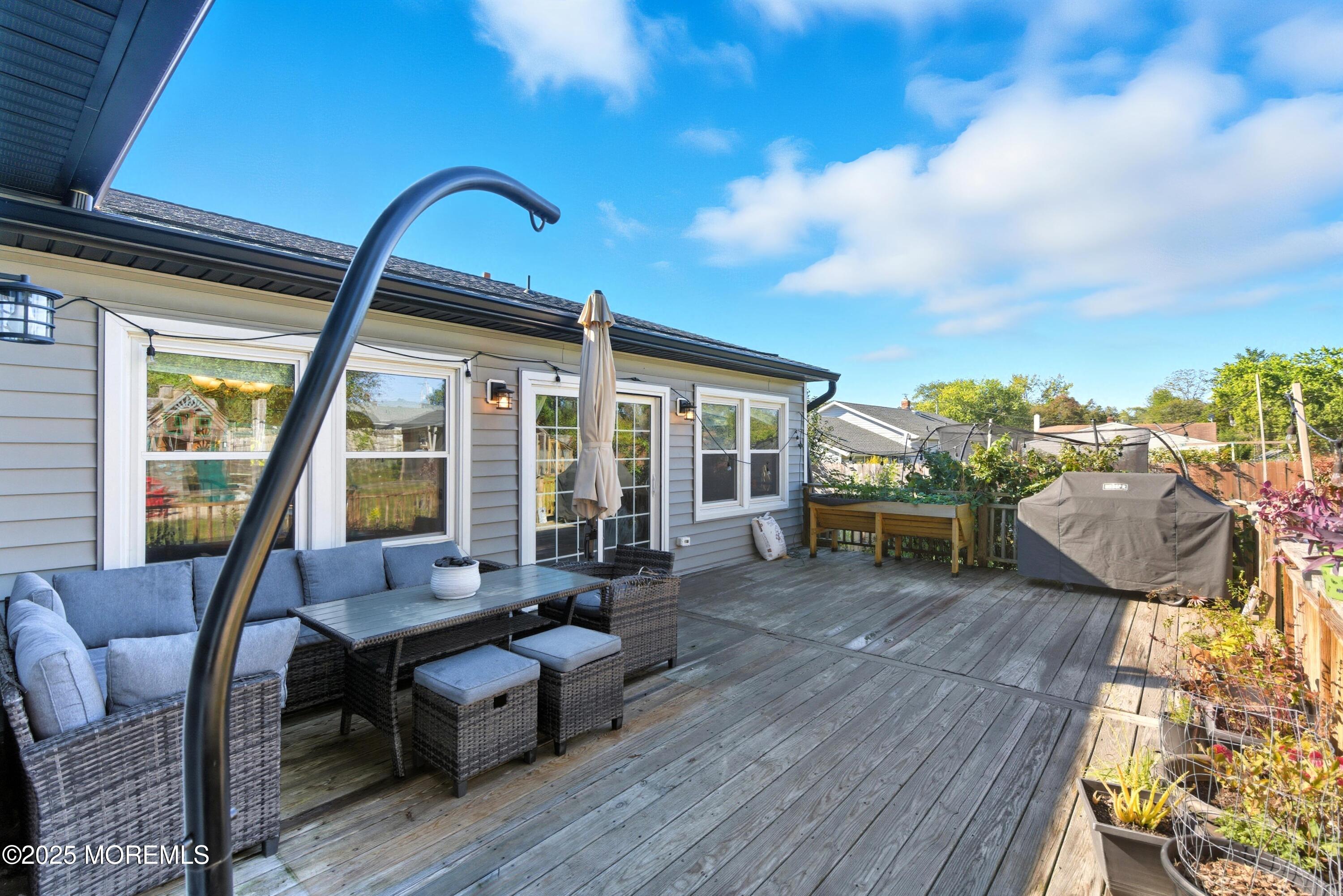 10 Marion Avenue Howell, NJ 07731 - Photo 21 of 26 a living room with furniture and wooden floor