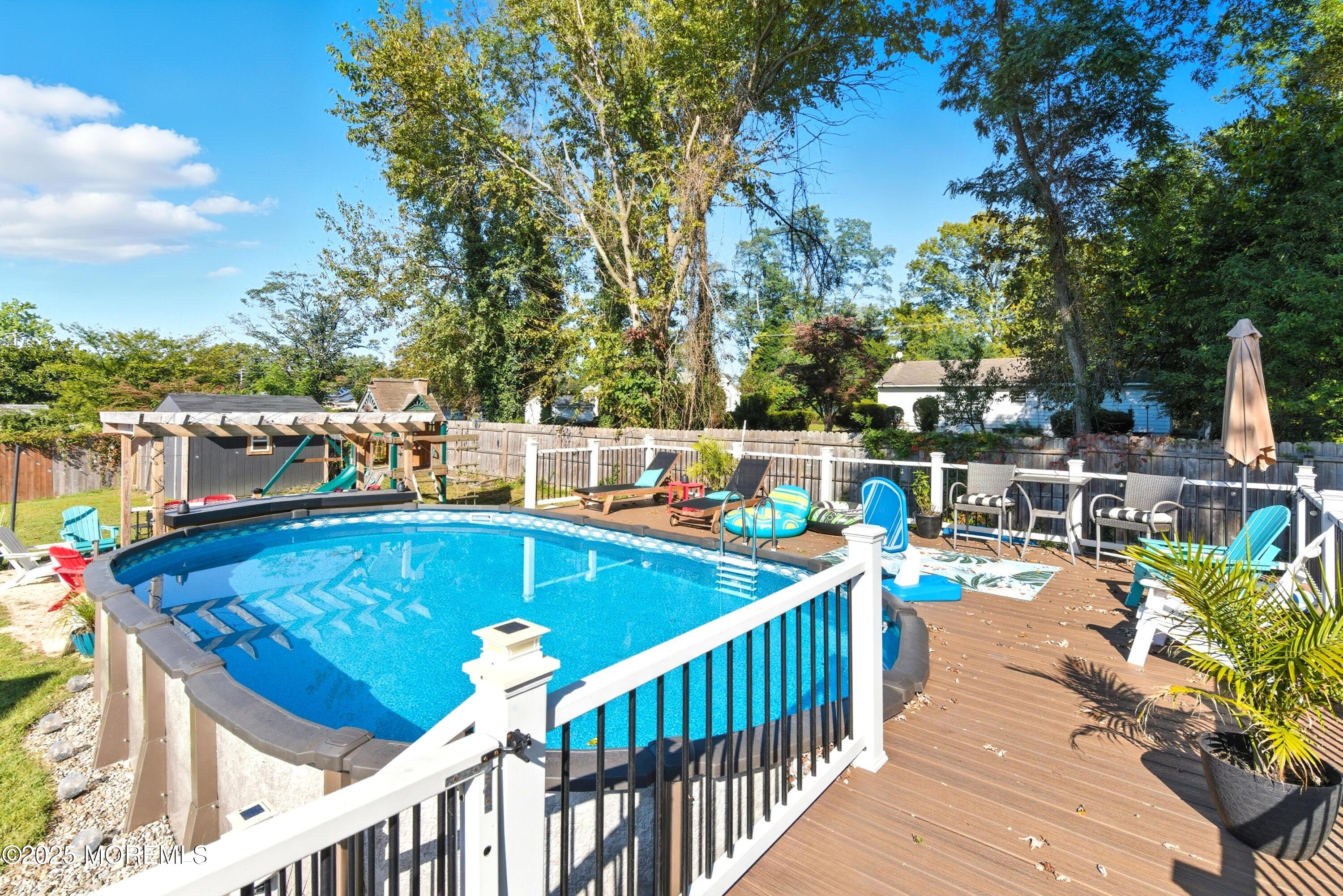 10 Marion Avenue Howell, NJ 07731 - Photo 22 of 26 a view of a chairs and table on the balcony