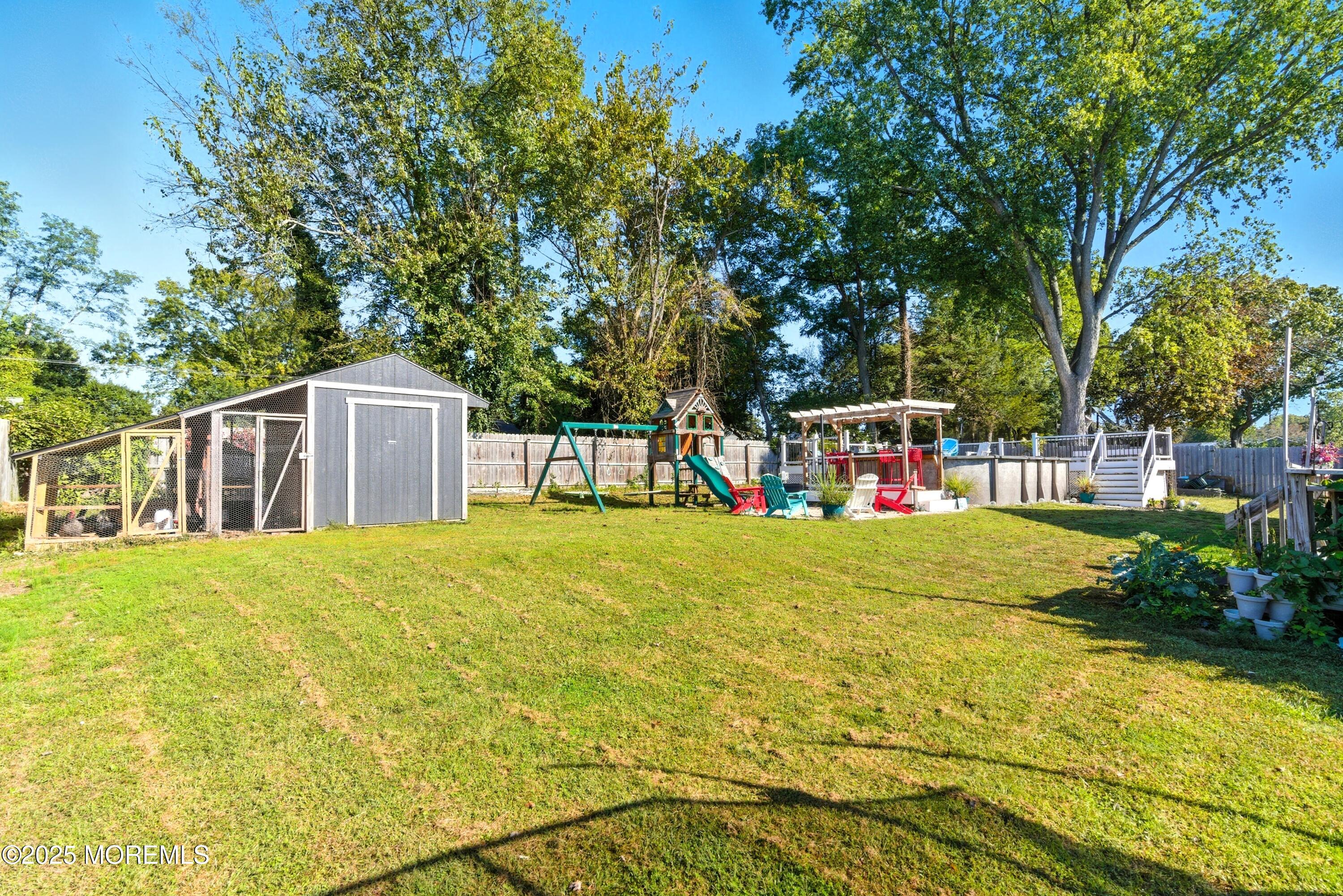 10 Marion Avenue Howell, NJ 07731 - Photo 24 of 26 a house with trees in front of it