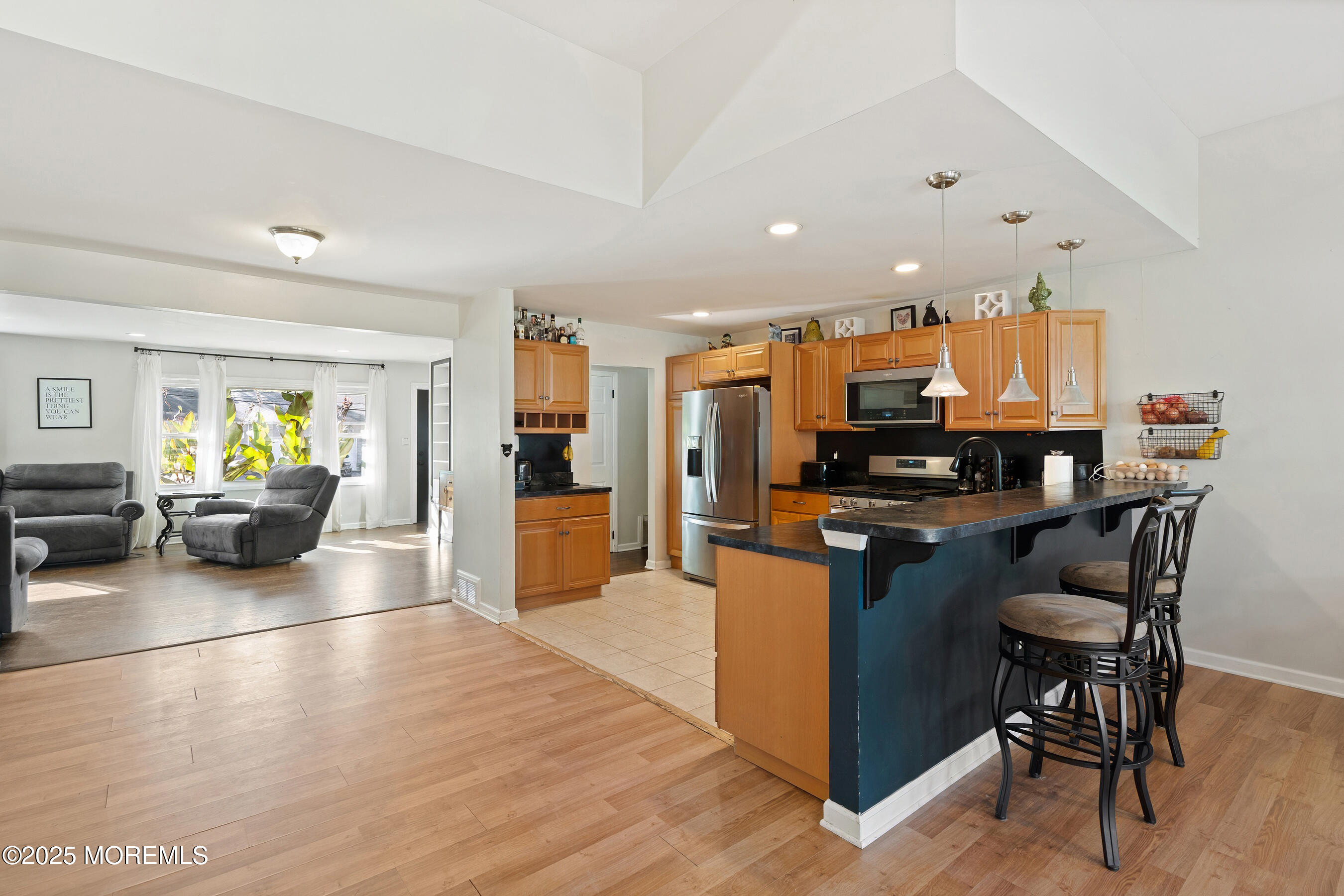 10 Marion Avenue Howell, NJ 07731 - Photo 5 of 26 a kitchen with stainless steel appliances kitchen island granite countertop a stove and cabinets