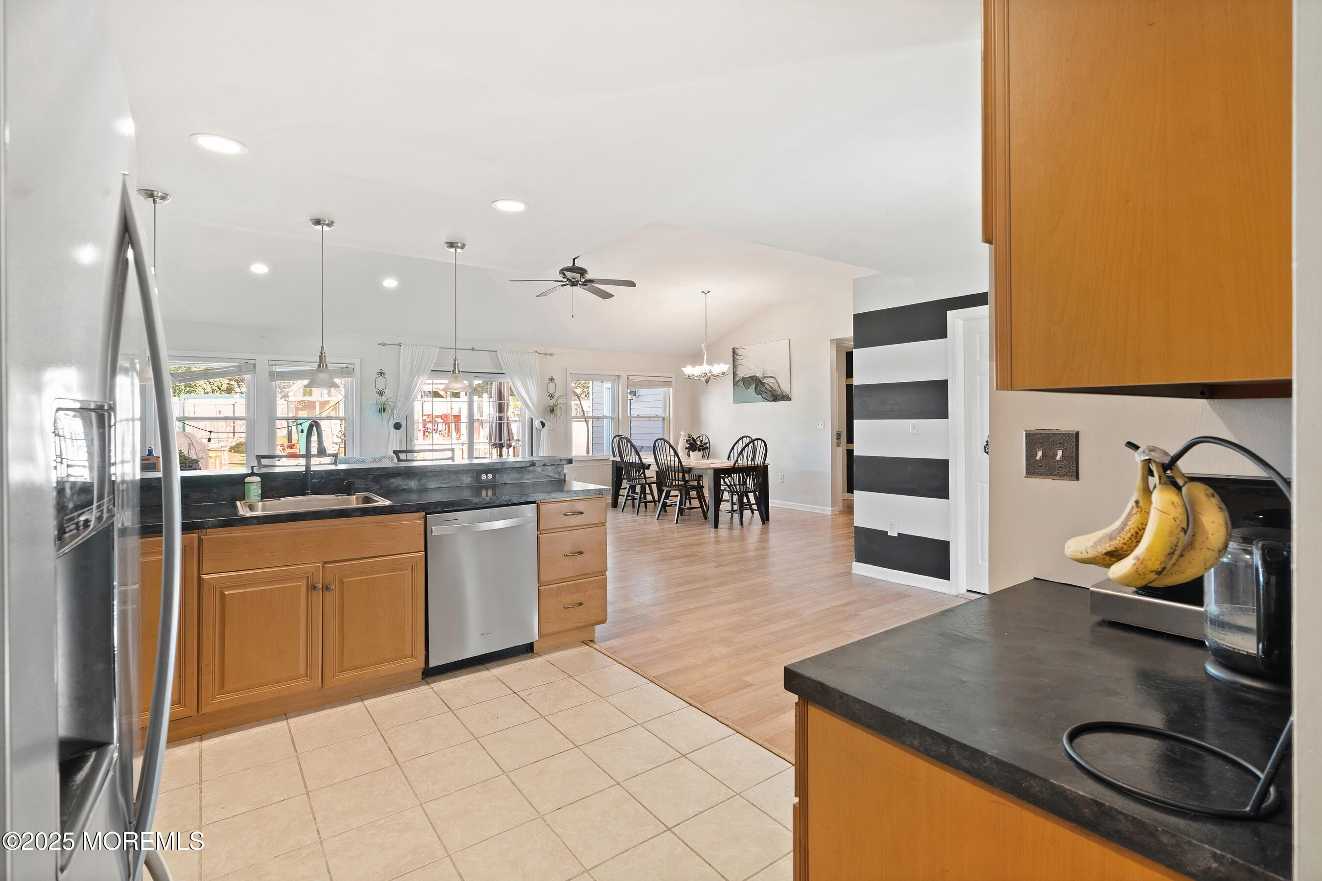 10 Marion Avenue Howell, NJ 07731 - Photo 7 of 26 a kitchen with stainless steel appliances granite countertop a sink counter space and stove