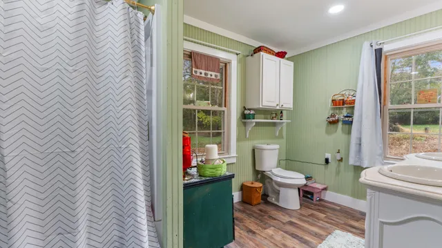 a bathroom with a toilet and a sink