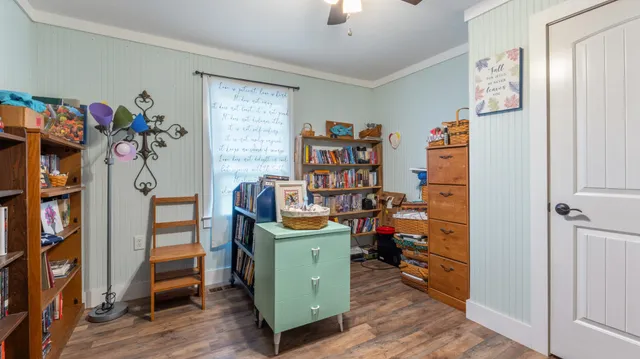 a view of a workspace with furniture and bedroom