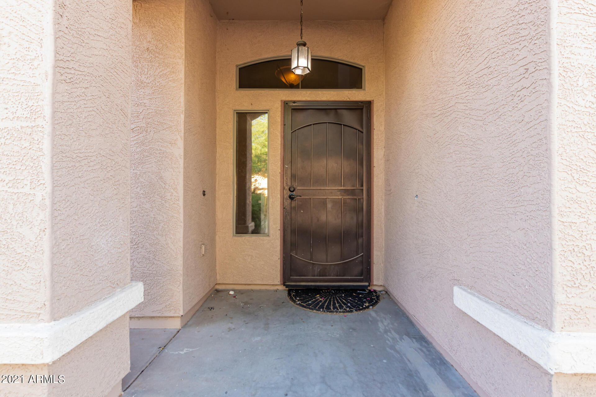 5505 West Pecan Road Laveen, AZ 85339 - Photo 3 of 31 a view of an empty room with glass door