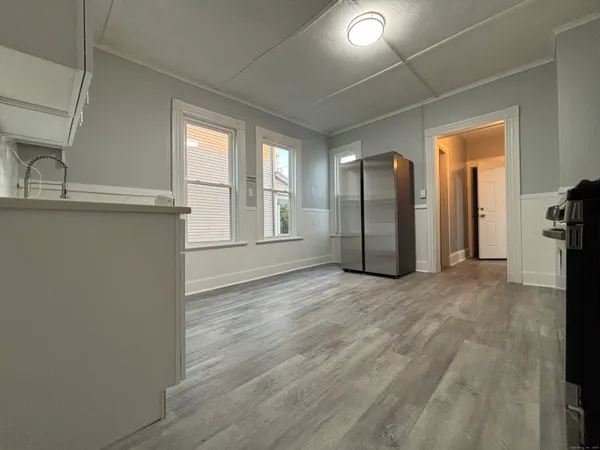 a view of an empty room with a window