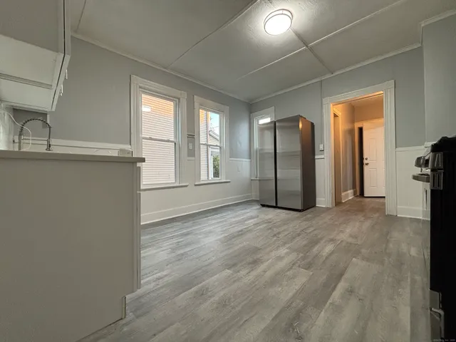 a view of an empty room with a window