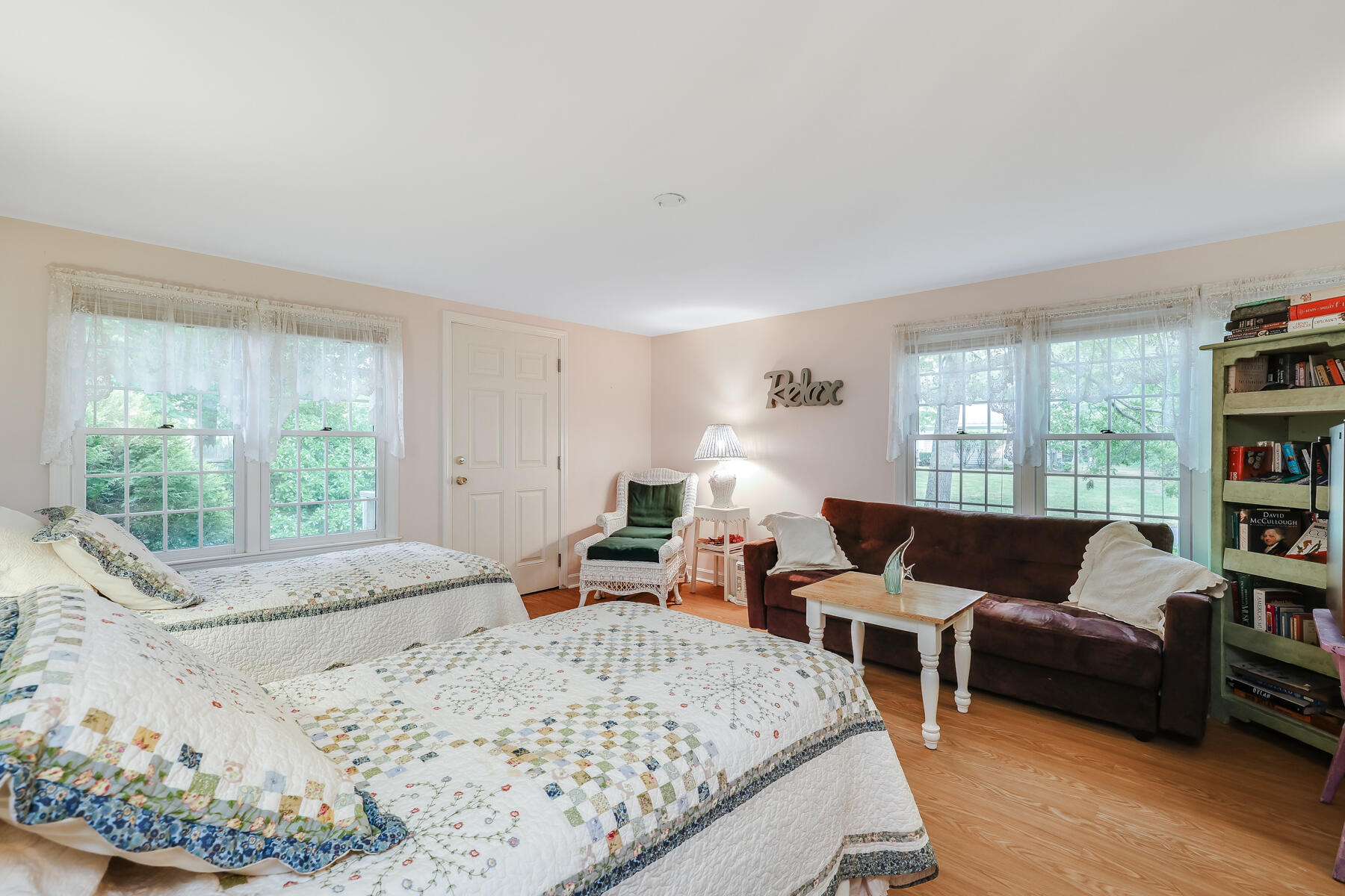 195 Sheaffer Road Centerville, MA 02632 - Photo 20 of 47 a living room with furniture and a large window