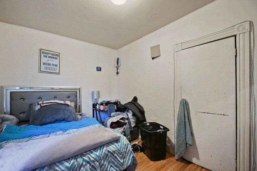 52 Crystal Street Worcester, MA 01603 - Photo 11 of 29 a bedroom with bed and a window