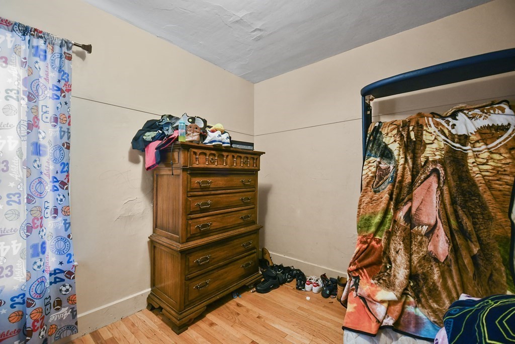 52 Crystal Street Worcester, MA 01603 - Photo 21 of 29 a view of walk in closet with clothes