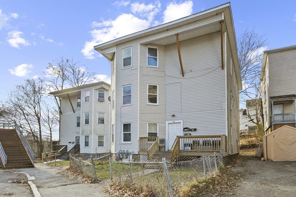 52 Crystal Street Worcester, MA 01603 - Photo 28 of 29 a view of a house with a patio