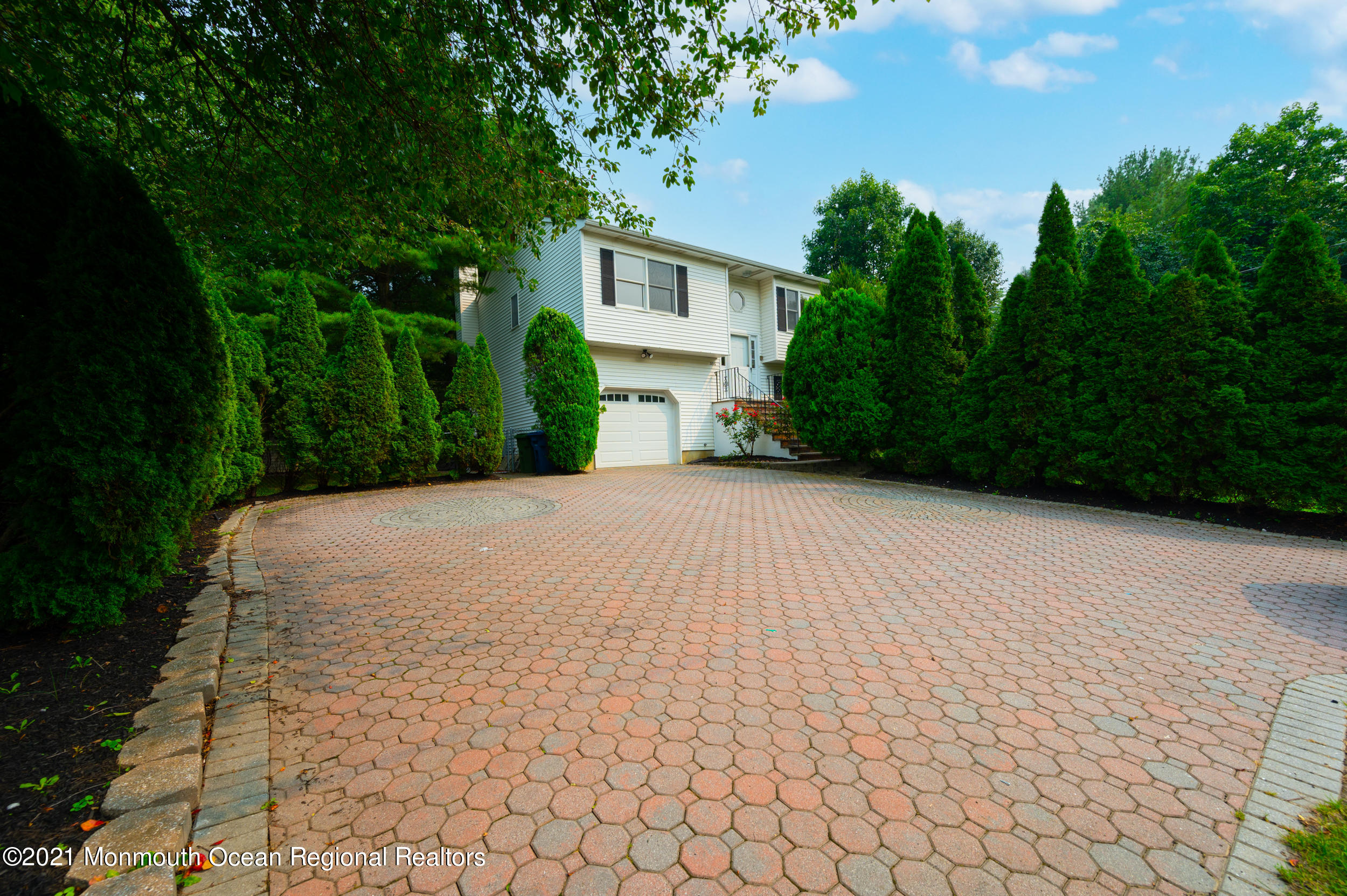 2816 Shafto Road Tinton Falls, NJ 07753 - Photo 2 of 24 a view of a house with a yard
