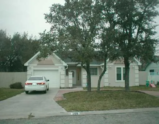 a car parked in front of a house