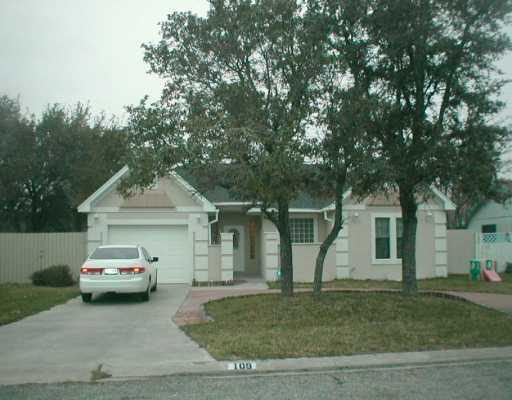 a car parked in front of a house