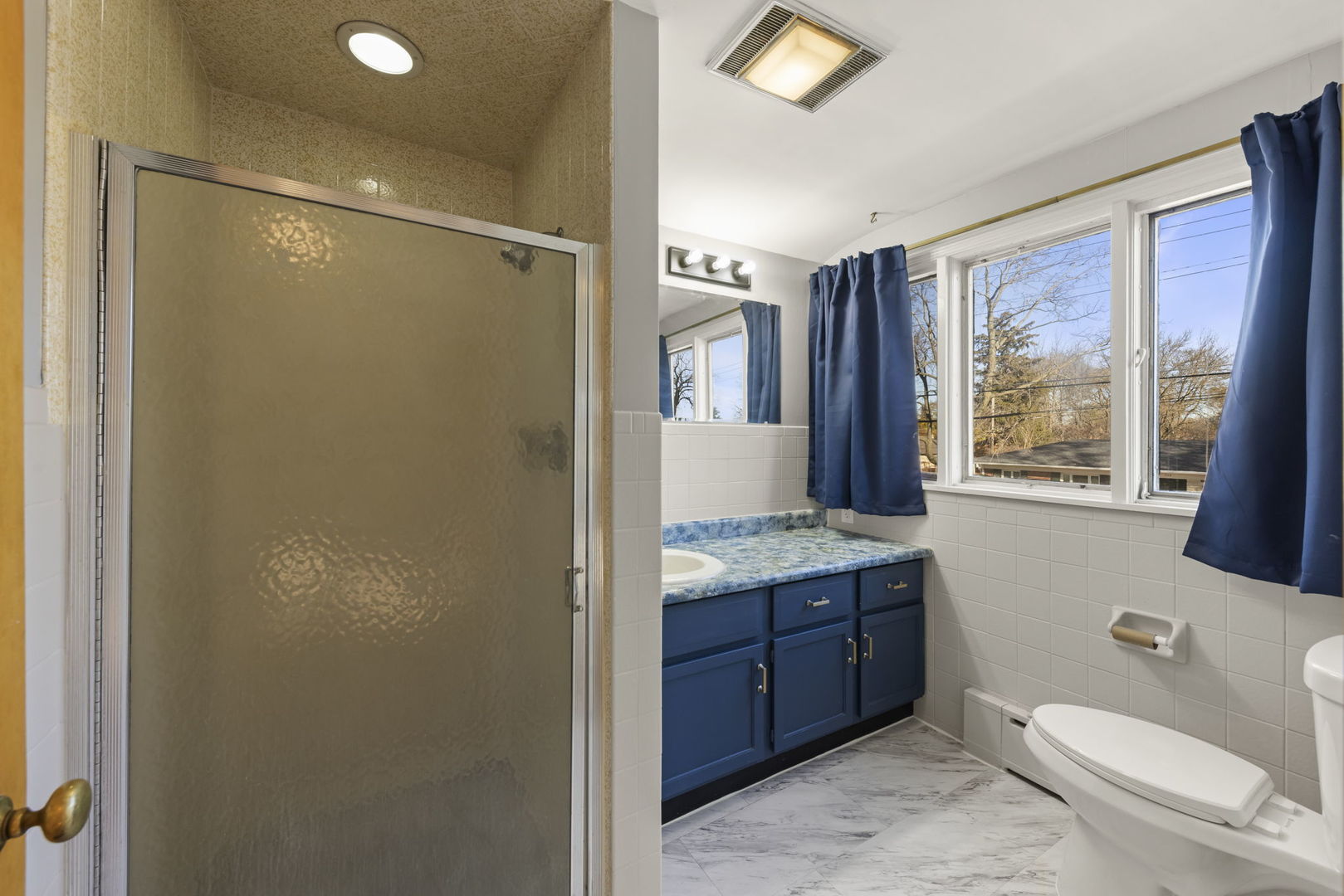 175 South Harrison Avenue Aurora, IL 60506 - Photo 18 of 25 a bathroom with a granite countertop sink toilet and shower