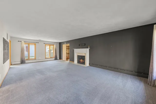 an empty room with windows