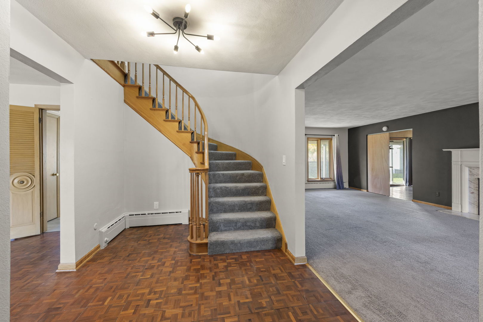 175 South Harrison Avenue Aurora, IL 60506 - Photo 5 of 25 a view of entryway and hall with wooden floor