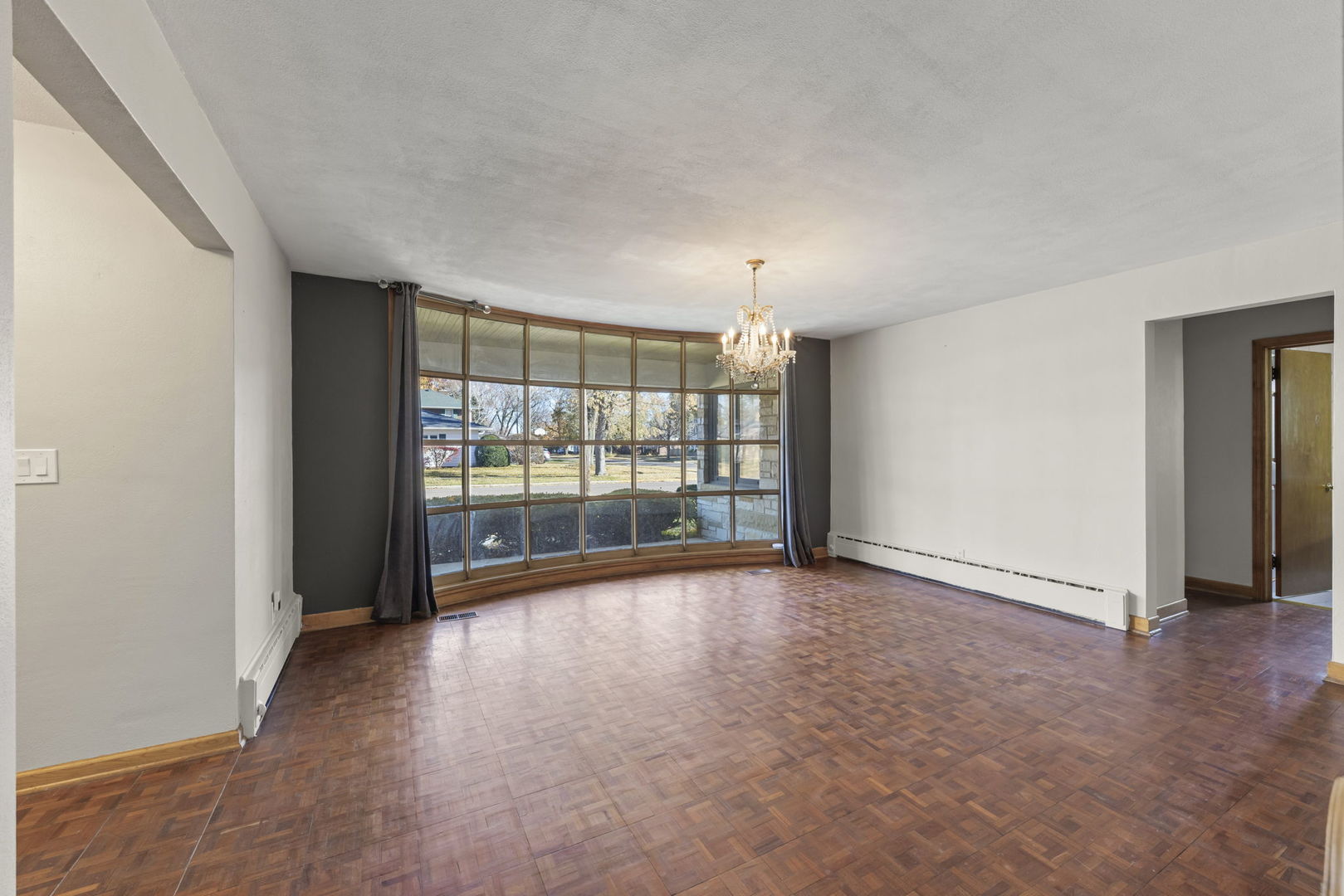 175 South Harrison Avenue Aurora, IL 60506 - Photo 10 of 25 wooden floor in an empty room with a window