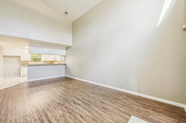 a view of kitchen with wooden floor