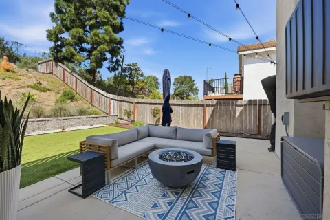 a view of swimming pool with outdoor seating