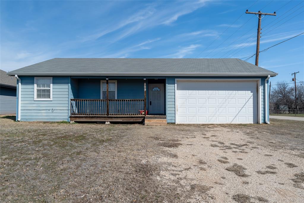309 South Cedar Street Holliday, TX 76366 - Photo 1 of 1 Ranch-style house with a porch