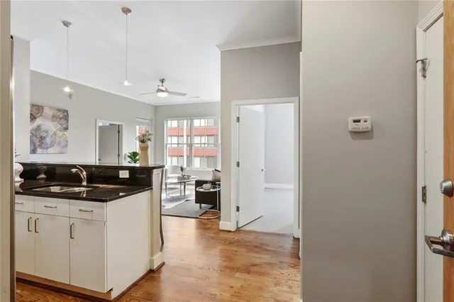 a kitchen with a sink and cabinets