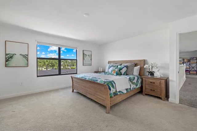 a building outdoor space with patio furniture and potted plants