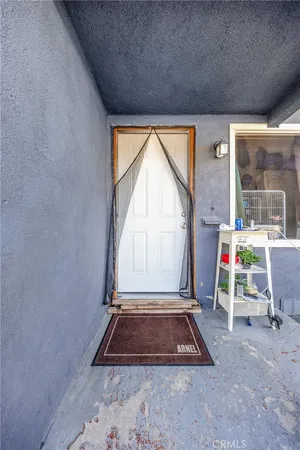 a view of a house with sitting area and porch