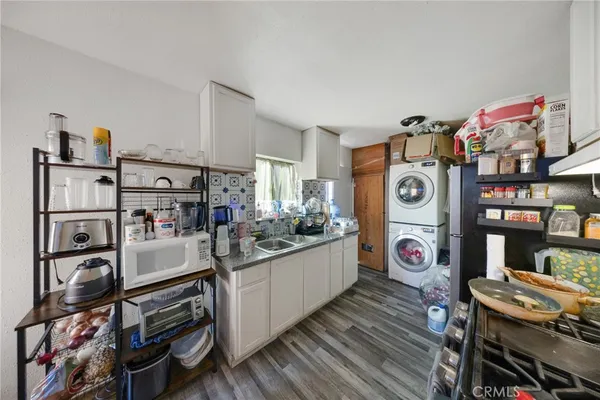 a bathroom with a toilet a sink and a mirror