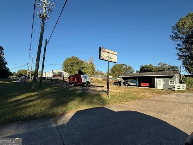 a view of a house with swimming pool