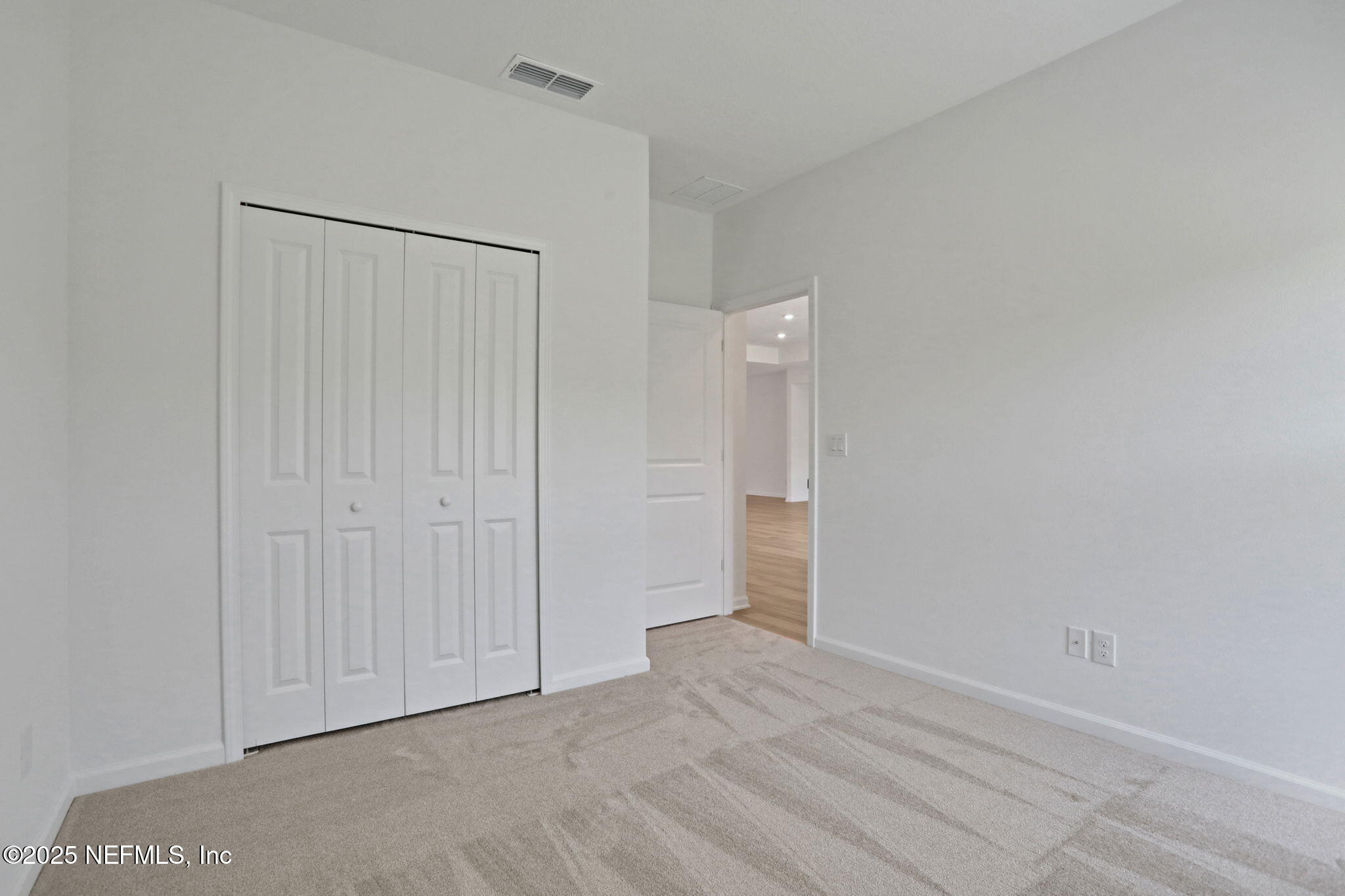 317 Archstone Way St. Augustine, FL 32092 - Photo 33 of 46 a view of an empty room