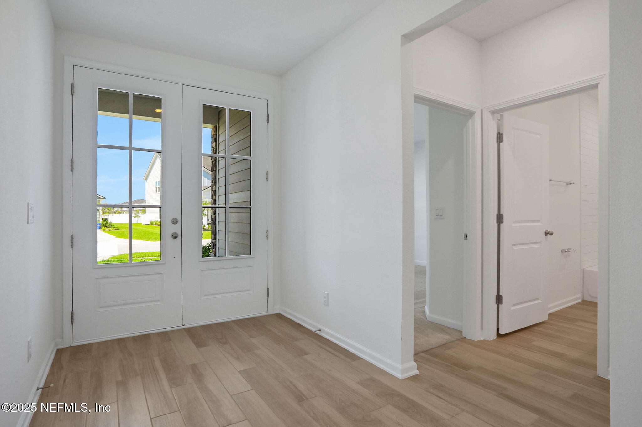 317 Archstone Way St. Augustine, FL 32092 - Photo 41 of 46 an empty room with windows and closet