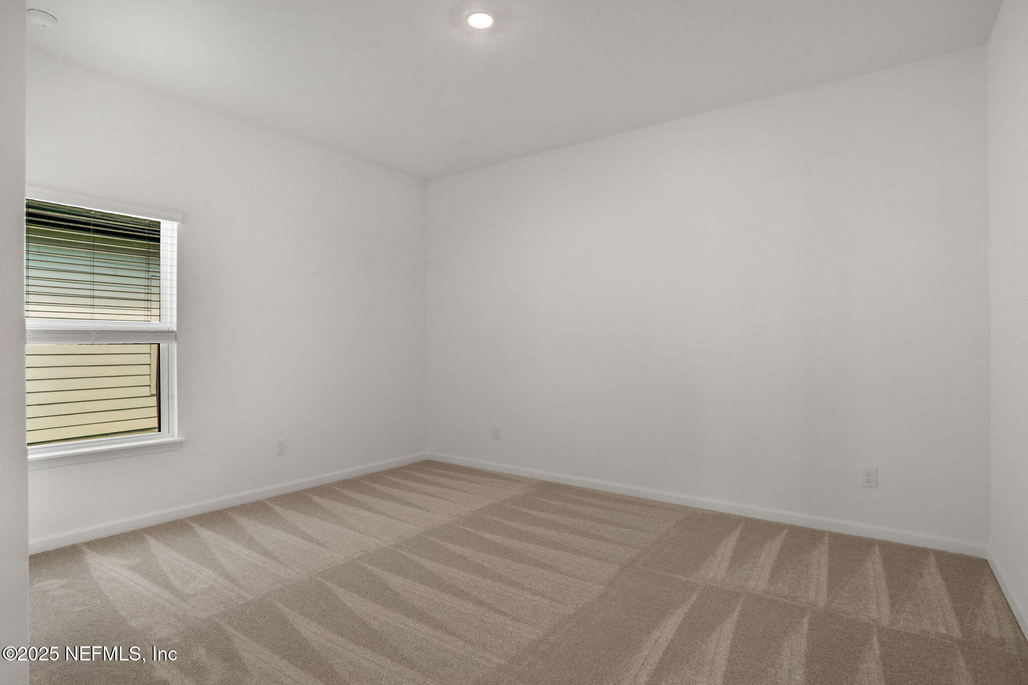 317 Archstone Way St. Augustine, FL 32092 - Photo 44 of 46 a view of a room that has a window in it