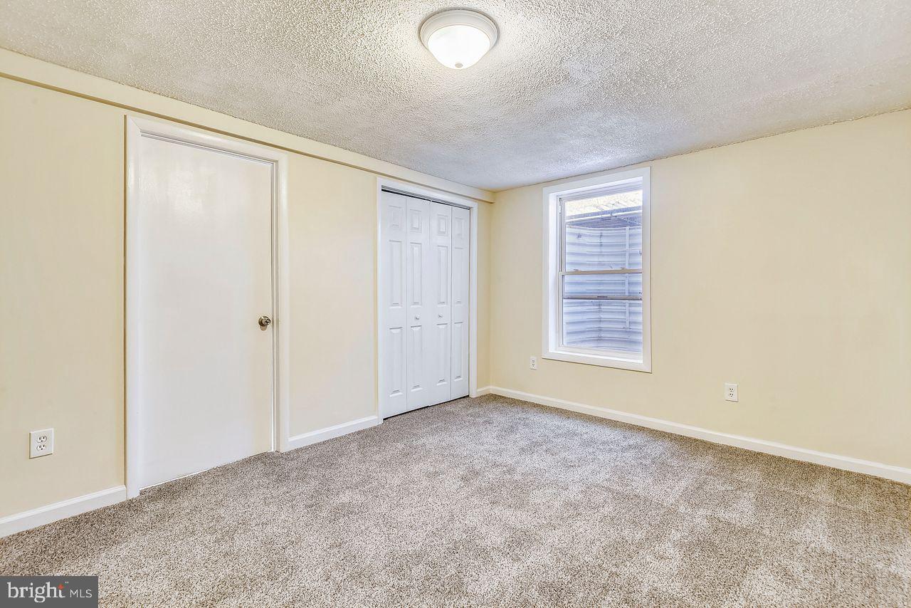 278 North Ferry Point Road Pasadena, MD 21122 - Photo 27 of 36 Lower level 5th bedroom