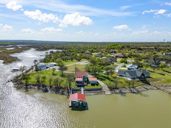 a view of a swimming pool with an outdoor seating