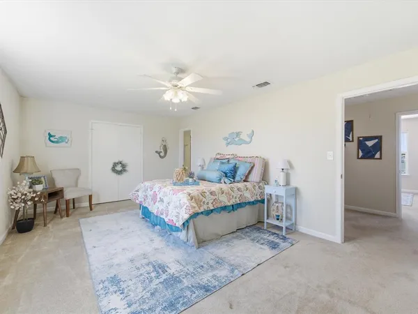 a bathroom with a sink a mirror and a shower