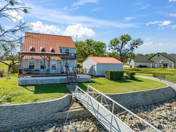 a small pool sitting in the middle of a lake