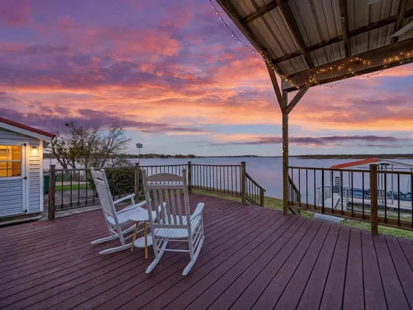 a view of a lake from a terrace