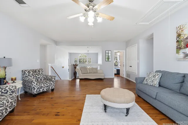 a living room with furniture and a couch